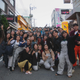 The first group of residents of Don’t Worry Village pose for a photo near the house on the last day of their stay in Mokpo.